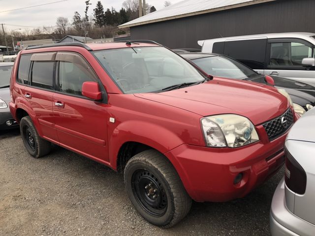 front of car NT30 - 2000 Nissan X-TRAIL  - RED