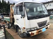 front photo of car MK25A - 2003 Nissan DIESEL DUMP  - WHITE