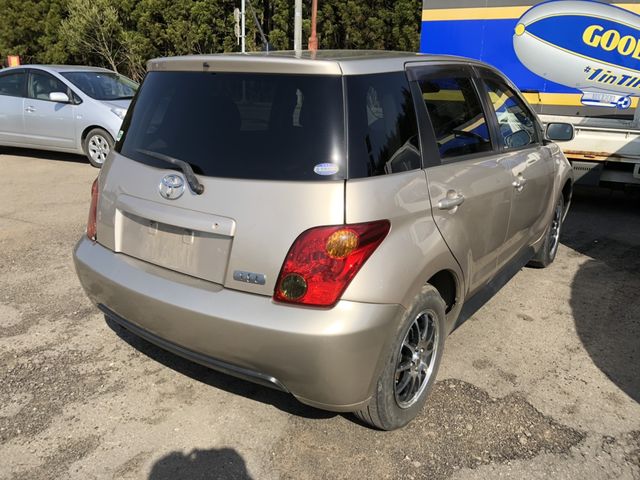 back of car NCP65 - 2002 Toyota IST  - BEIGE