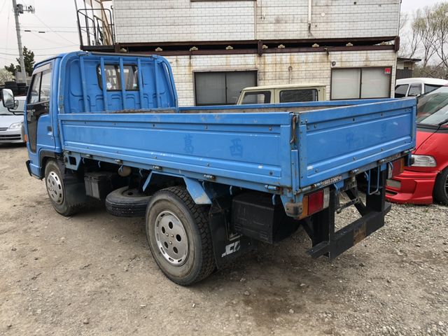 back of car NKR66E - 1993 Isuzu ELF HIGH DECK  - BLUE