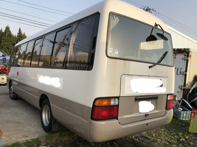 back of car HDB50 - 1994 Toyota COASTER BUS  - CREAM