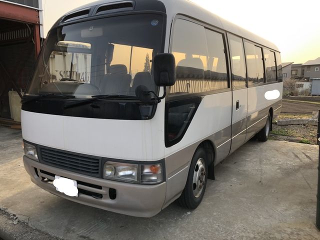 front of car HDB50 - 1994 Toyota COASTER BUS  - CREAM