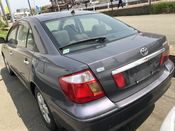 back photo of car ZZT240 - 2003 Toyota PREMIO A18 G PACKAGE LTD - GREY