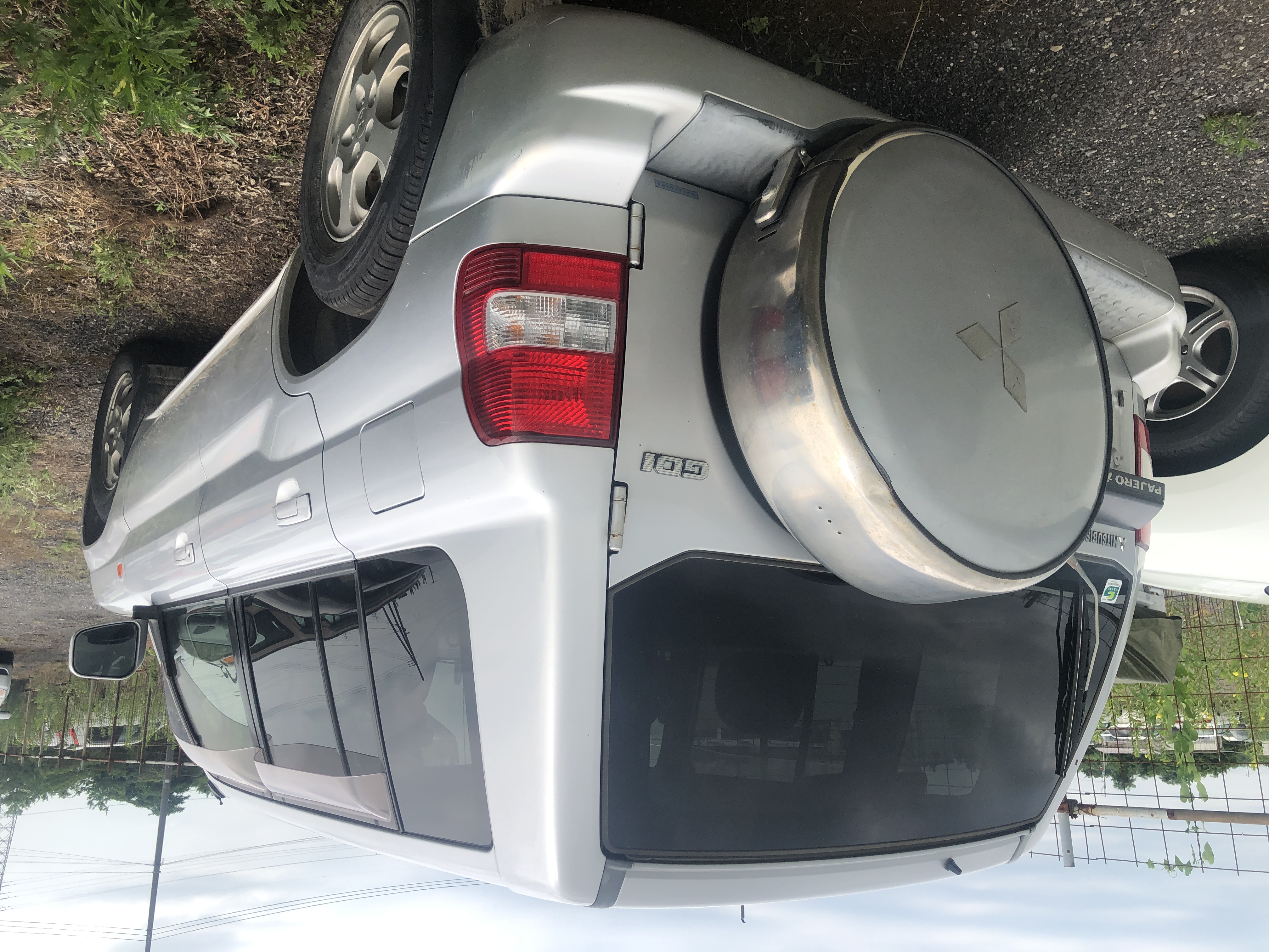 back of car H77W - 2002 Mitsubishi PAJERO IO  - SILVER