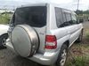 back photo of car H77W - 2002 Mitsubishi PAJERO IO  - SILVER